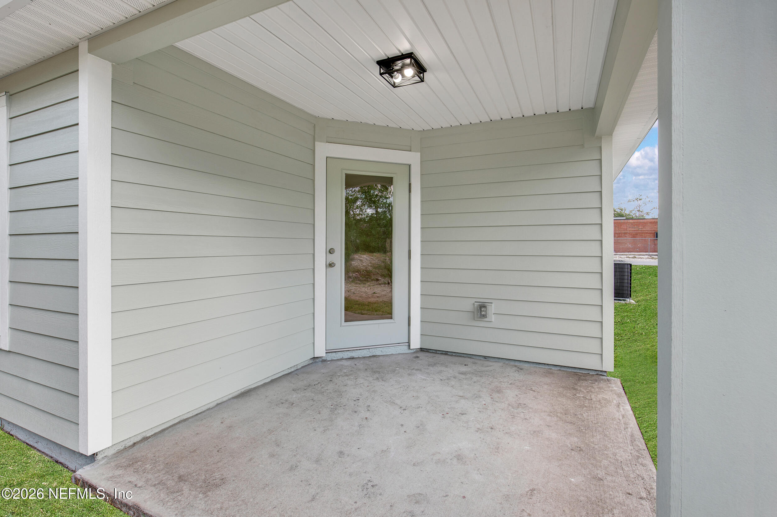 138 Kelly Smith School Road Palatka, FL 32177 - Photo 38 of 52 a view of front door and garage