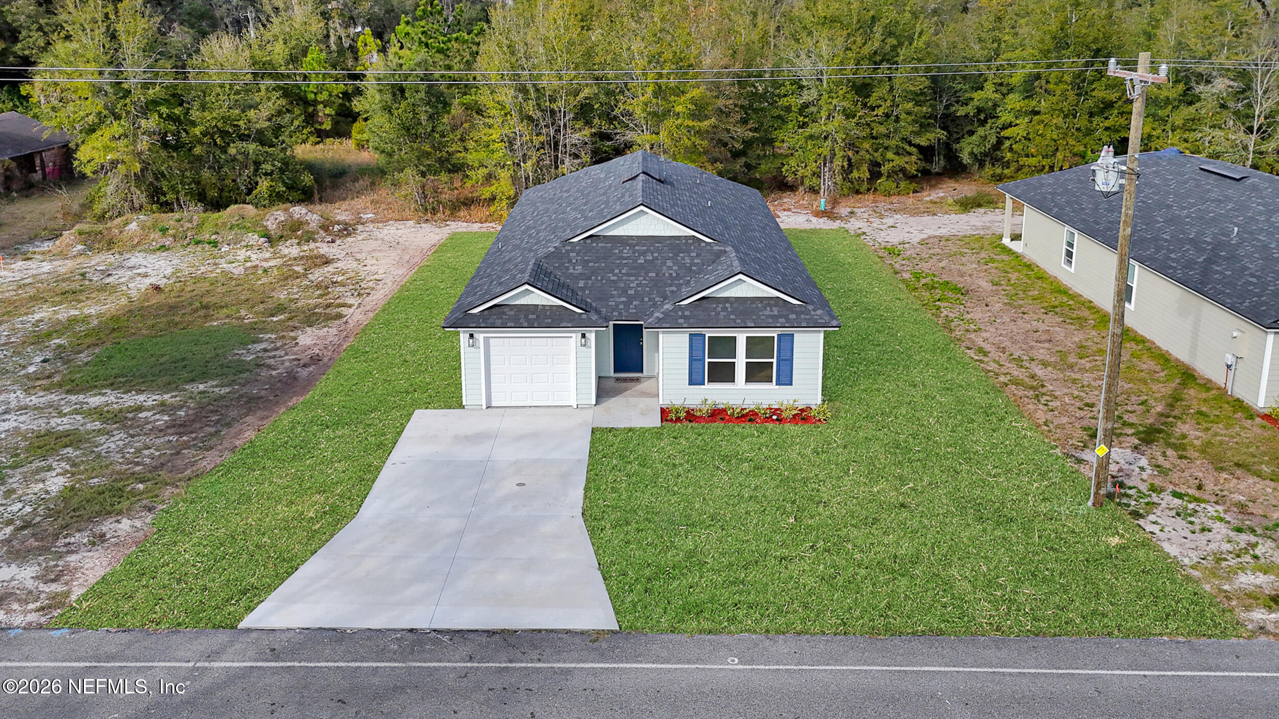 138 Kelly Smith School Road Palatka, FL 32177 - Photo 43 of 52 a aerial view of a house next to a yard with potted plants