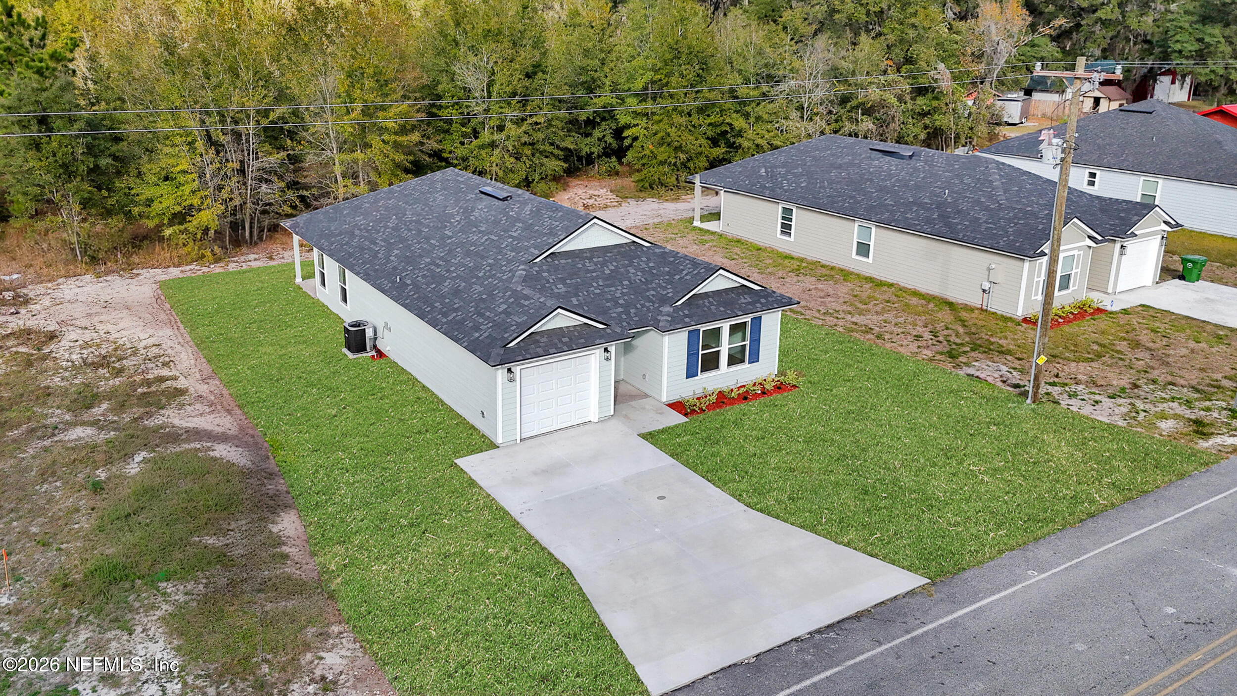 138 Kelly Smith School Road Palatka, FL 32177 - Photo 44 of 52 a aerial view of a house