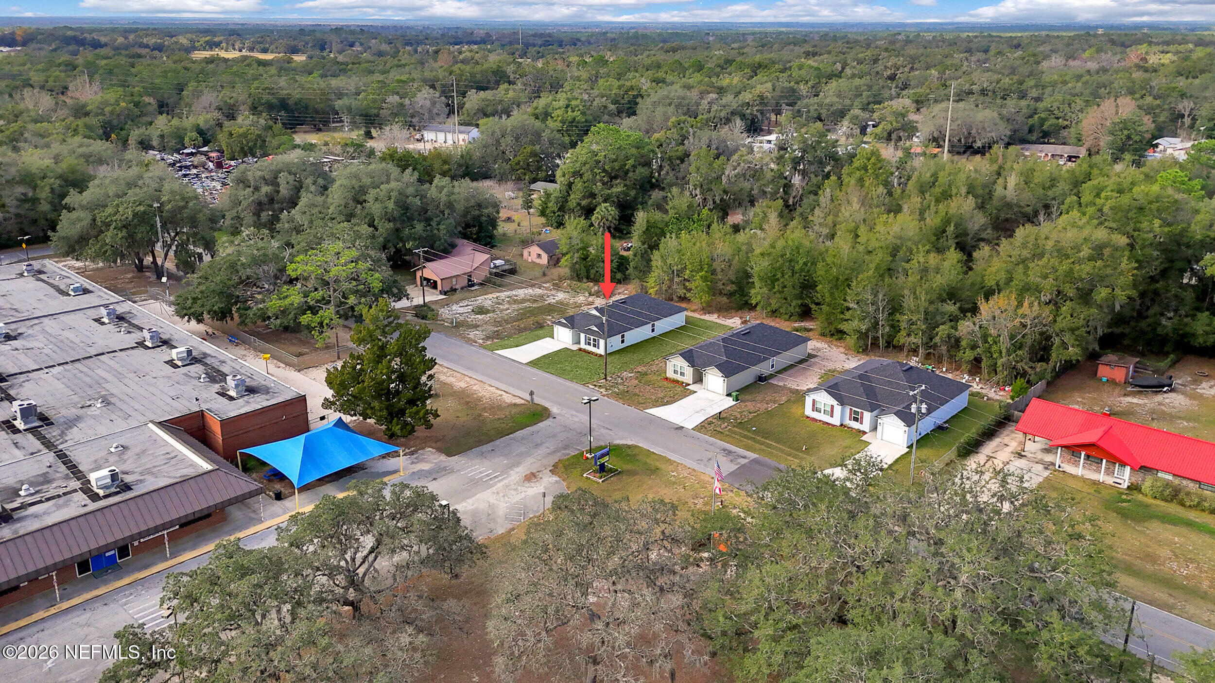 138 Kelly Smith School Road Palatka, FL 32177 - Photo 50 of 52 an aerial view of a house with a yard