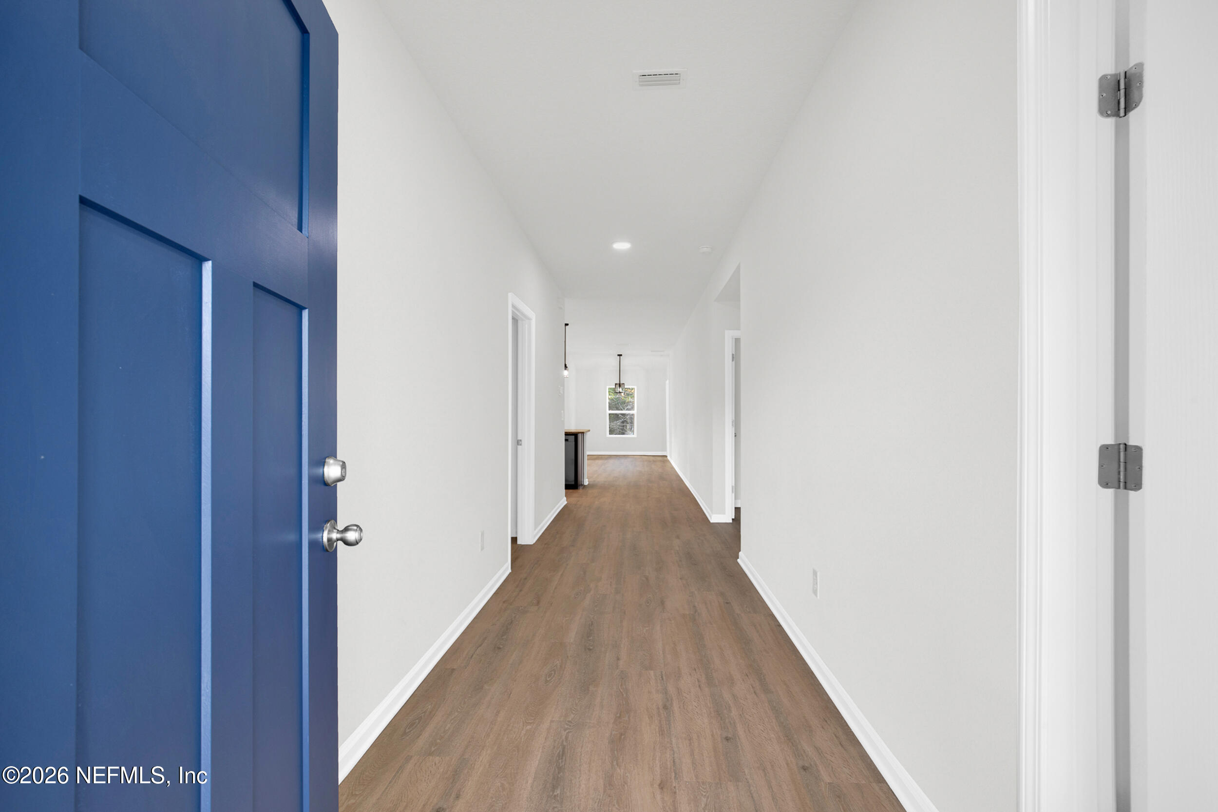 138 Kelly Smith School Road Palatka, FL 32177 - Photo 5 of 52 a view of a hallway with wooden floor