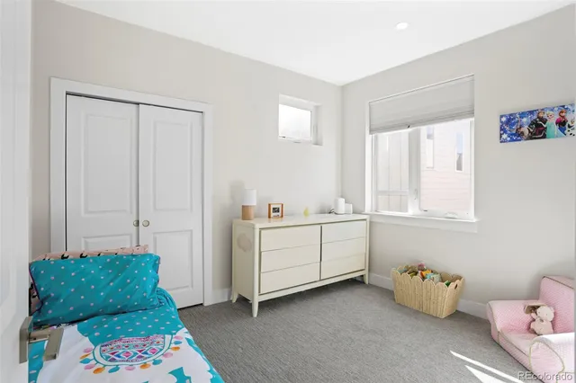 a room with toys and a window