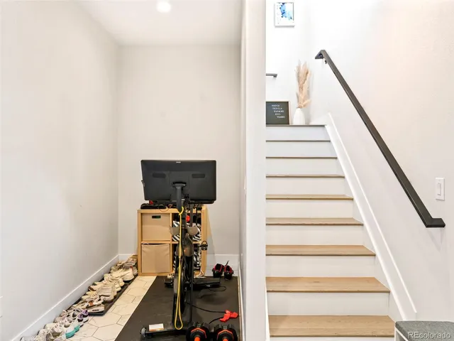 a view of entryway with stairs and furniture