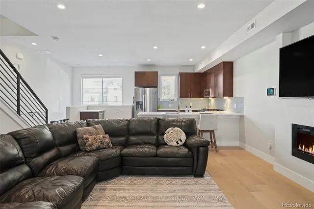a living room with a couch and a flat screen tv