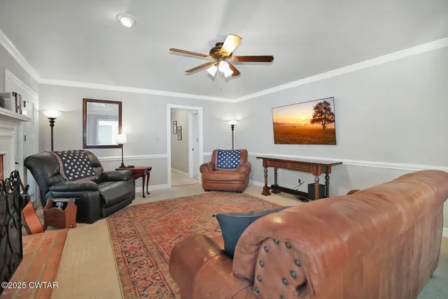 a bedroom with two beds and a chandelier