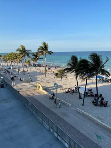 a view of a balcony with an ocean view