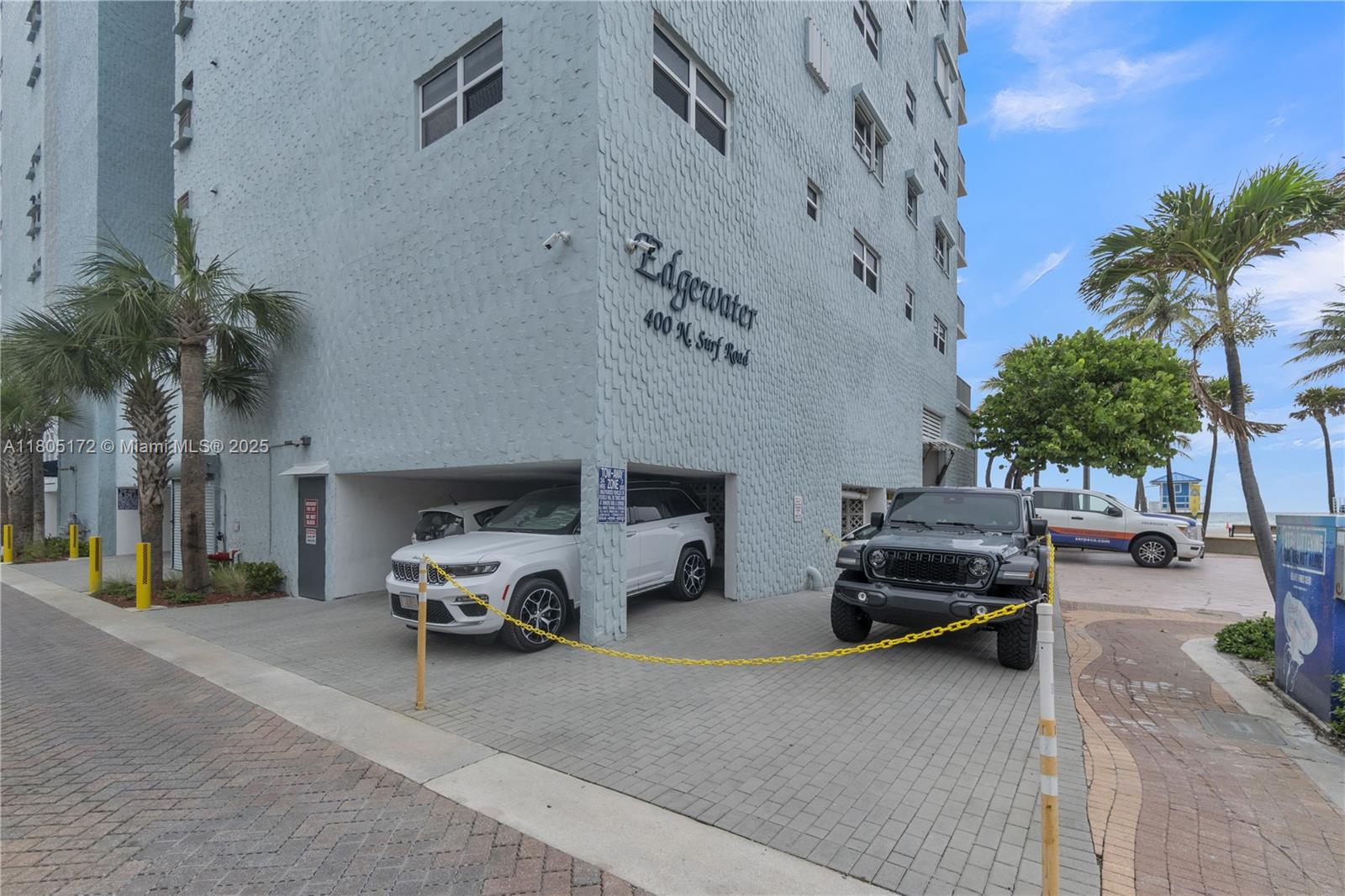 400 North Surf Road, Unit 504 Hollywood, FL 33019 - Photo 15 of 44 a car parked in front of building