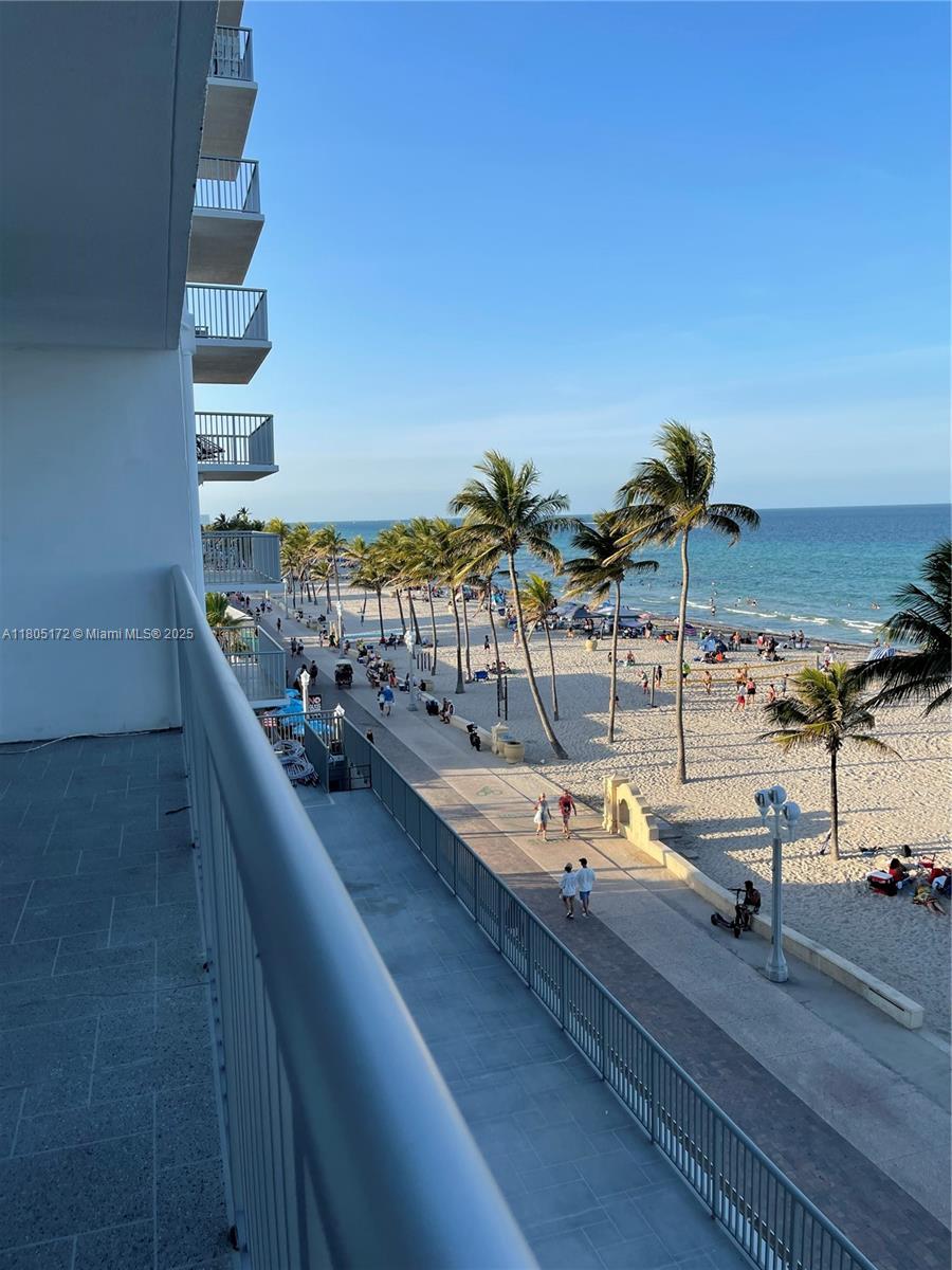 400 North Surf Road, Unit 504 Hollywood, FL 33019 - Photo 16 of 44 a view of a balcony with an ocean view