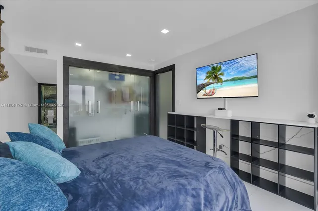 a kitchen with stainless steel appliances granite countertop a stove and a refrigerator