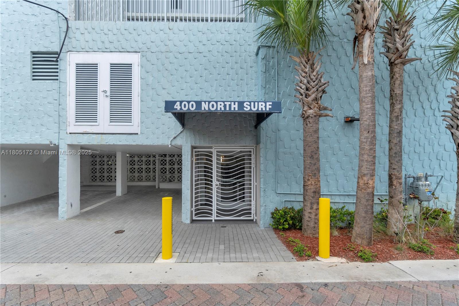 400 North Surf Road, Unit 504 Hollywood, FL 33019 - Photo 26 of 44 a front view of a house with street