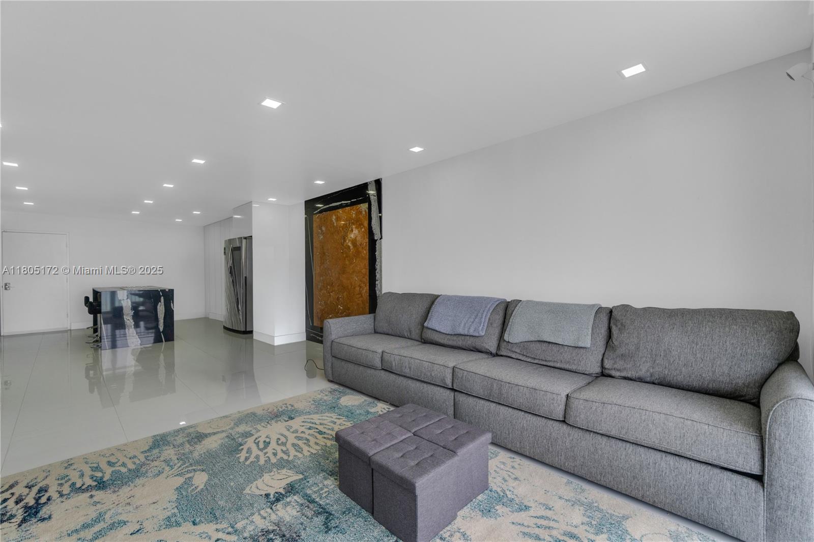 400 North Surf Road, Unit 504 Hollywood, FL 33019 - Photo 28 of 44 a living room with furniture and a couch