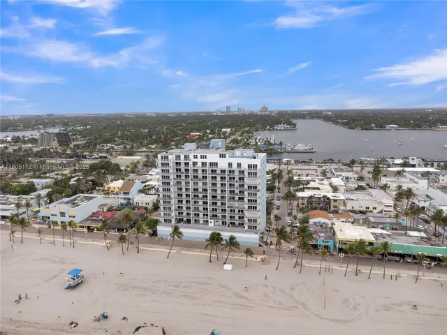 a bedroom with a bed and a chair