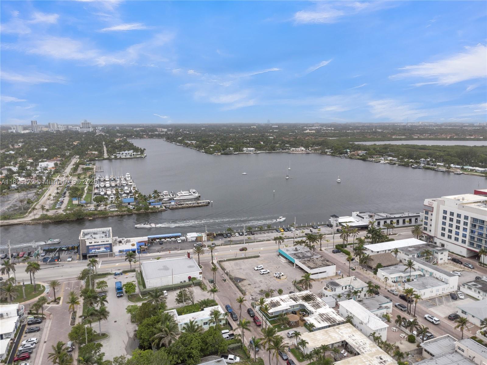 400 North Surf Road, Unit 504 Hollywood, FL 33019 - Photo 40 of 44 a view of a lake and a mountain