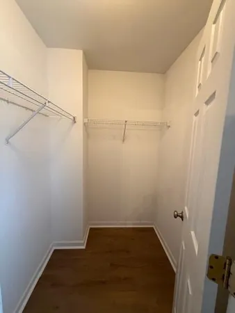 a view of a room with racks on the wall