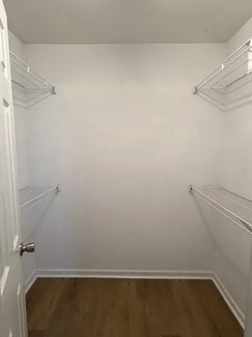 a view of a room with racks on the wall