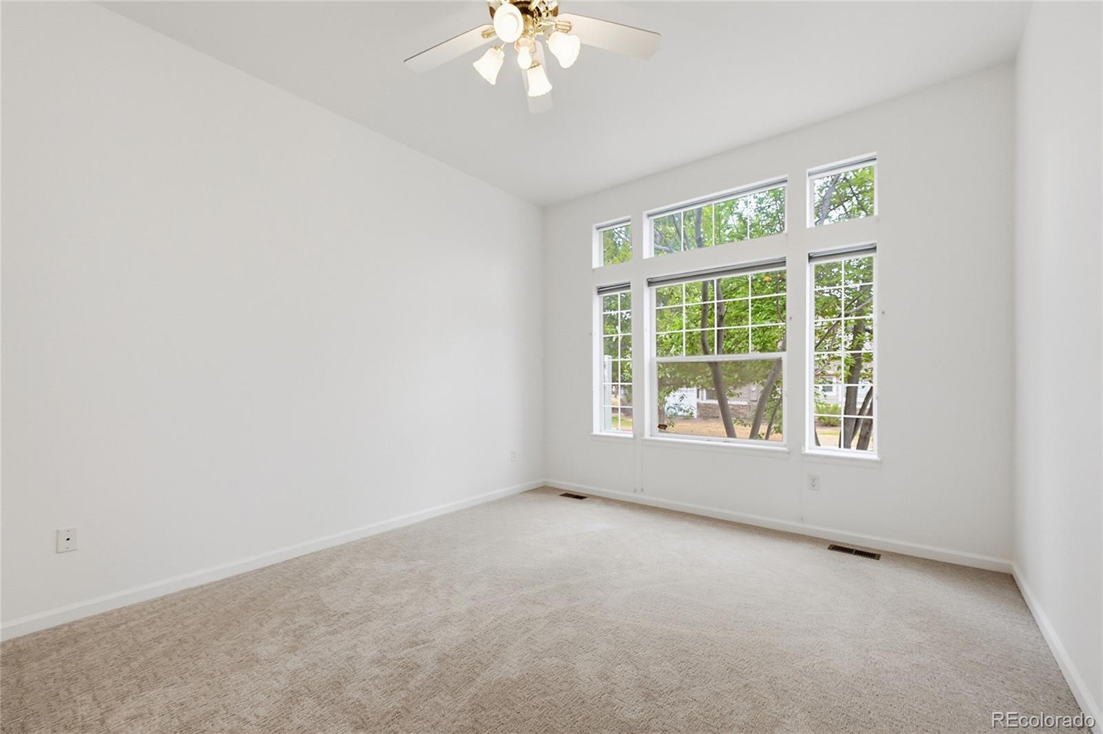 6383 Deframe Way Arvada, CO 80004 - Photo 19 of 49 an empty room with a window