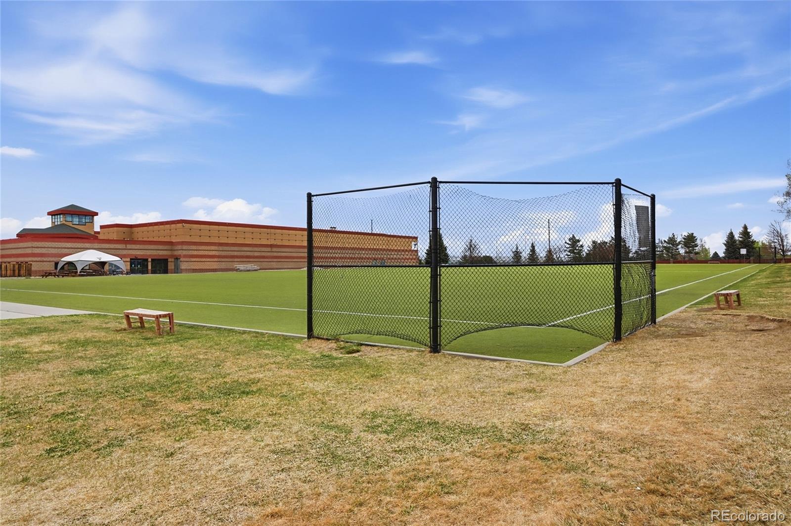 6383 Deframe Way Arvada, CO 80004 - Photo 38 of 49 a view of a field with grass
