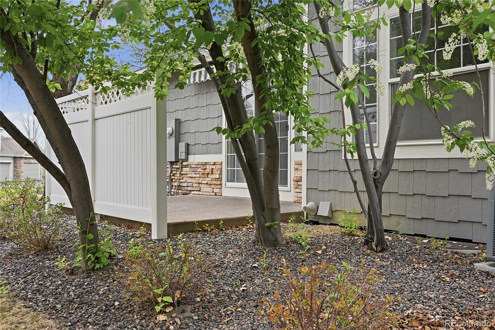 6383 Deframe Way Arvada, CO 80004 - Photo 44 of 49 a view of a tree in front of a yard