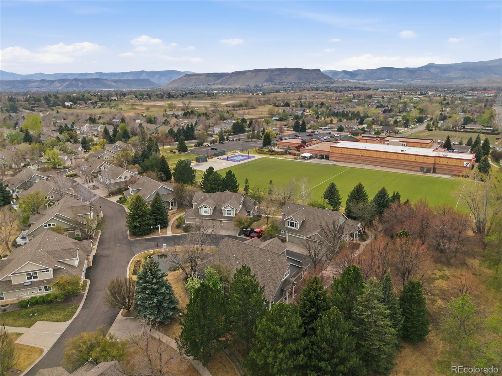 6383 Deframe Way Arvada, CO 80004 - Photo 47 of 49 an aerial view of a residential houses with outdoor space and trees