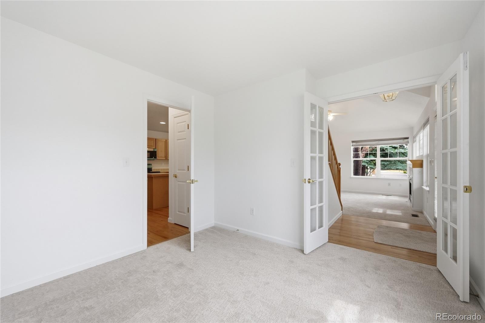 6383 Deframe Way Arvada, CO 80004 - Photo 6 of 49 an empty room with entrance
