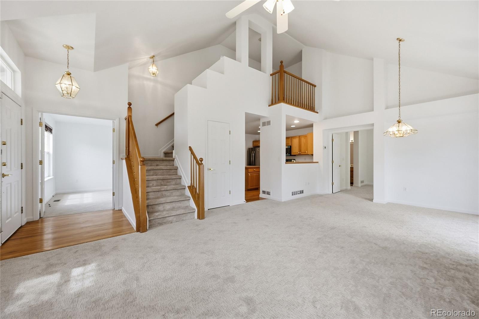 6383 Deframe Way Arvada, CO 80004 - Photo 8 of 49 an entryway of a room with closet and ceiling fan