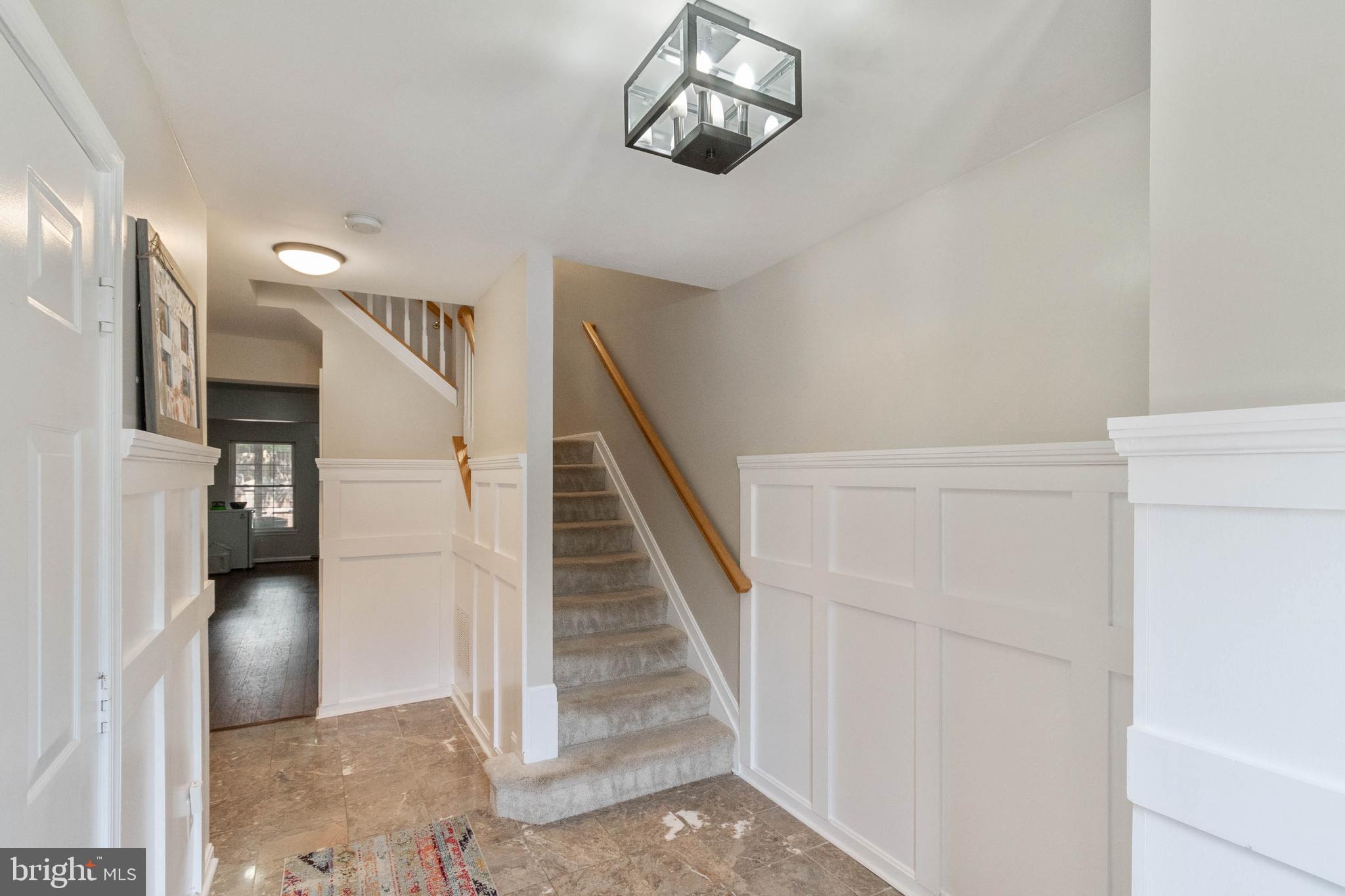 20385 Farmgate Terrace Ashburn, VA 20147 - Photo 2 of 27 a view of a hallway with entryway