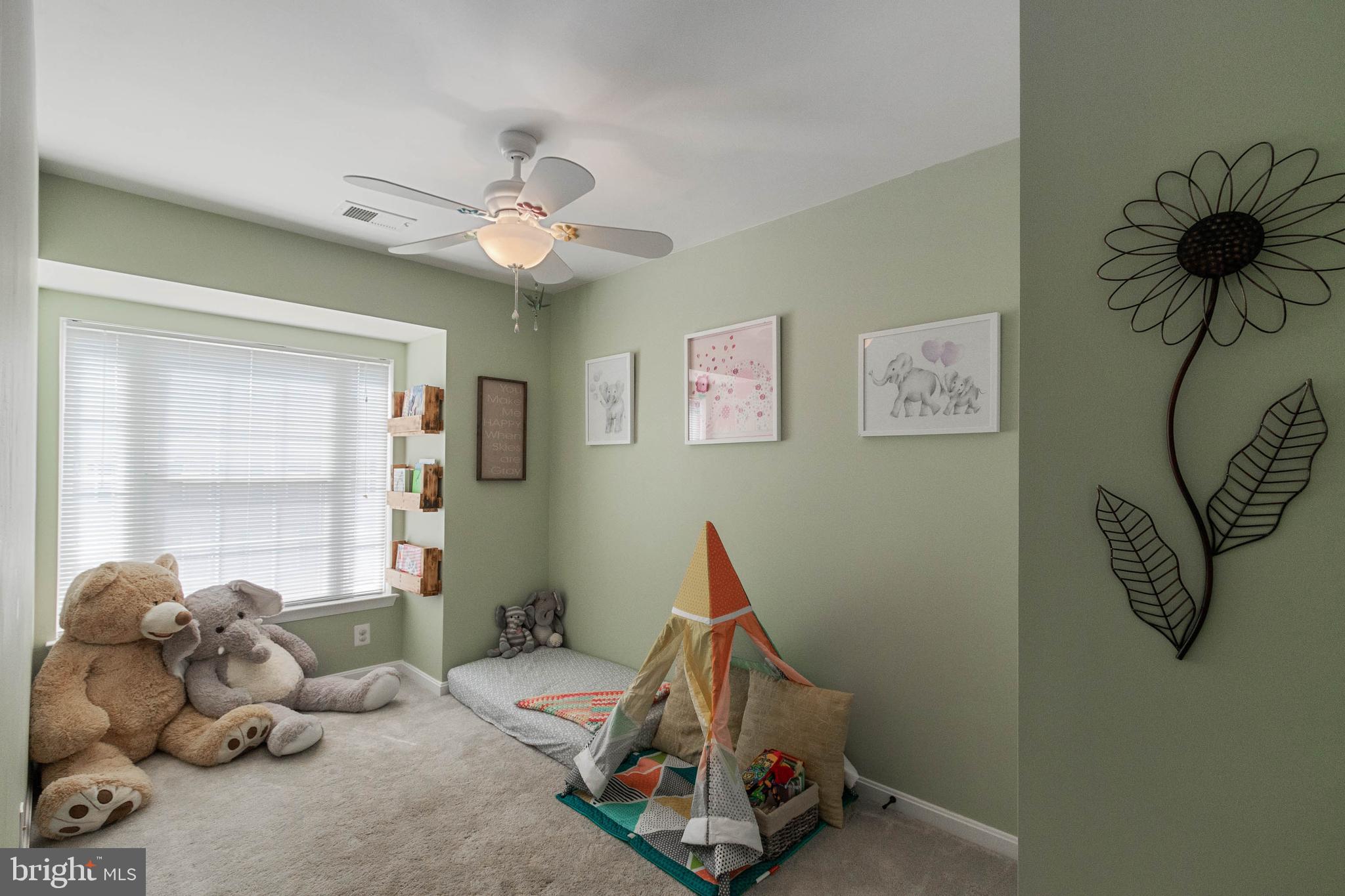 20385 Farmgate Terrace Ashburn, VA 20147 - Photo 16 of 27 a bedroom with furniture and a window