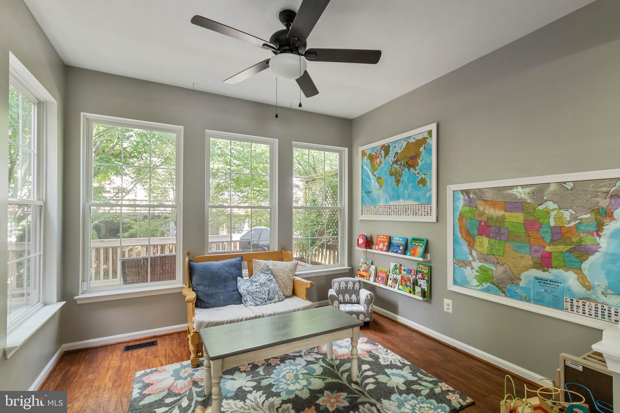 20385 Farmgate Terrace Ashburn, VA 20147 - Photo 9 of 27 a living room with furniture and a large window
