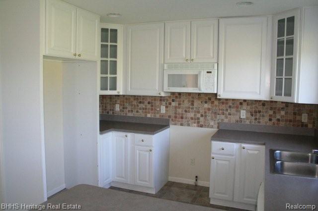 1207 North Nicholson Road Fowlerville, MI 48836 - Photo 9 of 21 Kitchen