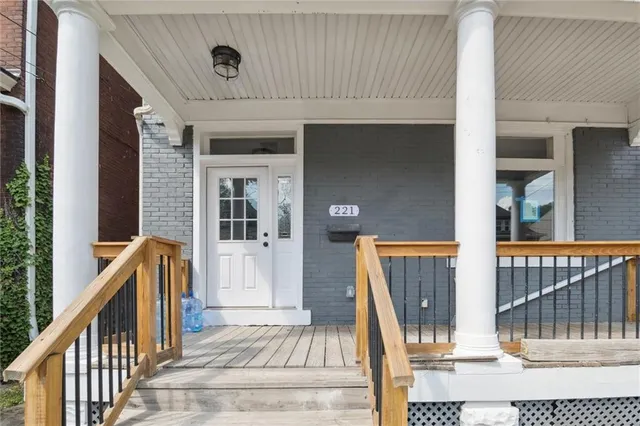 a view of entryway with wooden floor