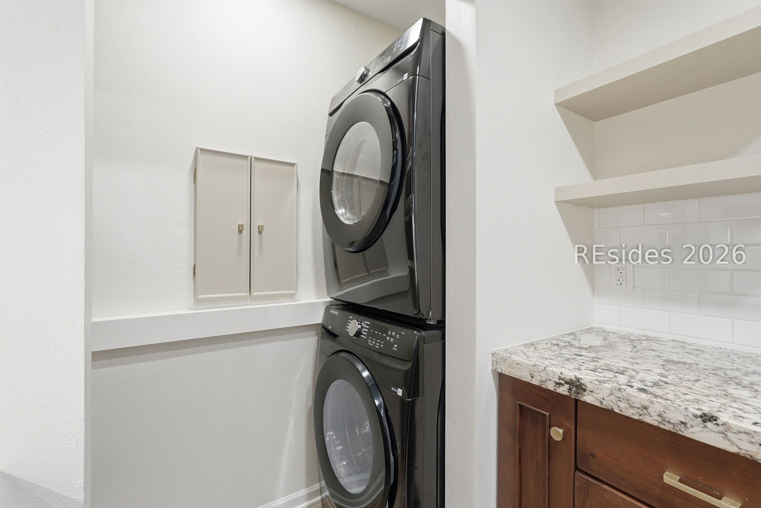 897 Fording Island Road, Unit 1303 Bluffton, SC 29910 - Photo 15 of 48 Stacked LG washer and dryer.