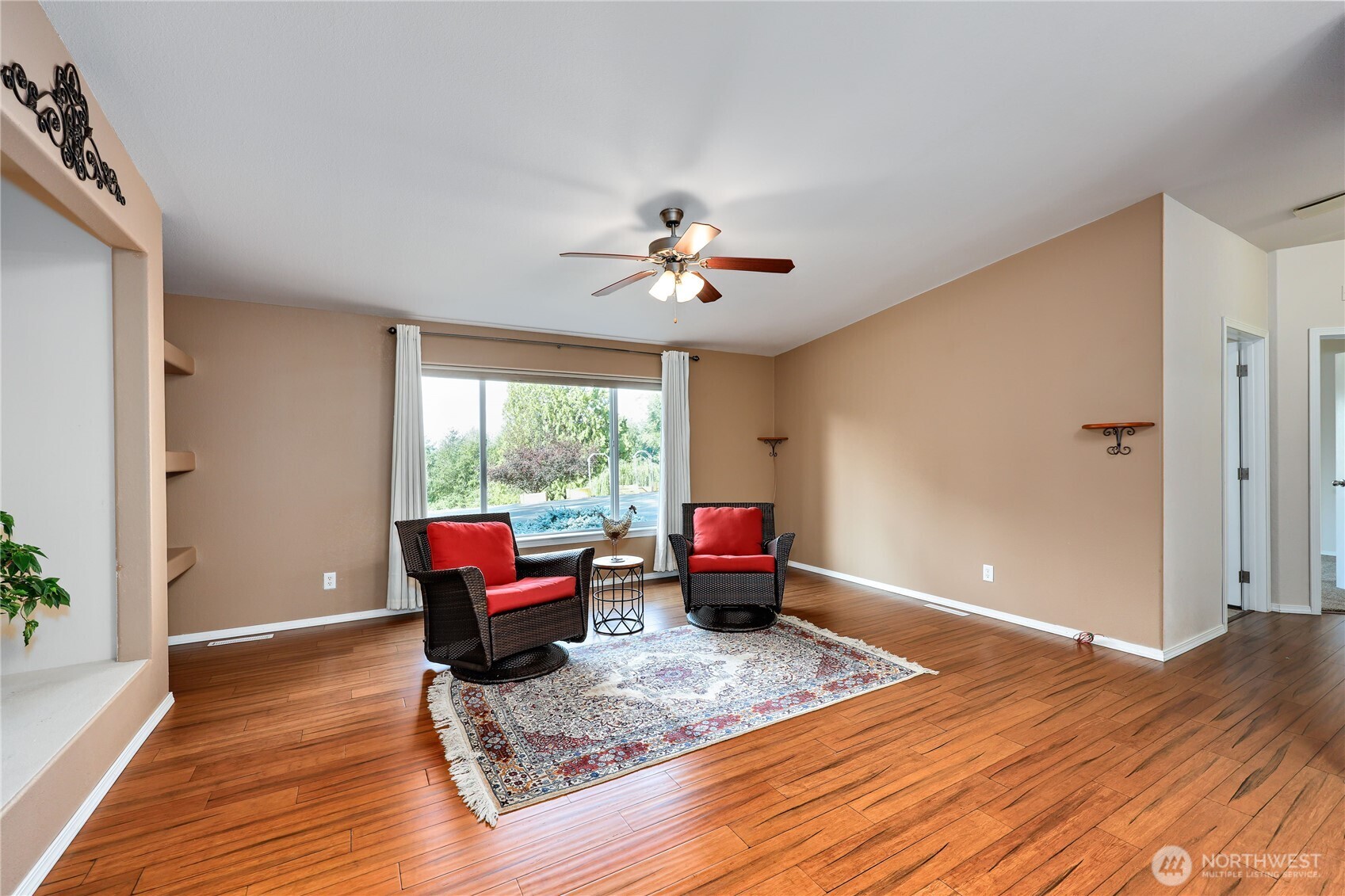 35025 Little Boston Road Northeast Kingston, WA 98346 - Photo 16 of 40 a living room with furniture and wooden floor