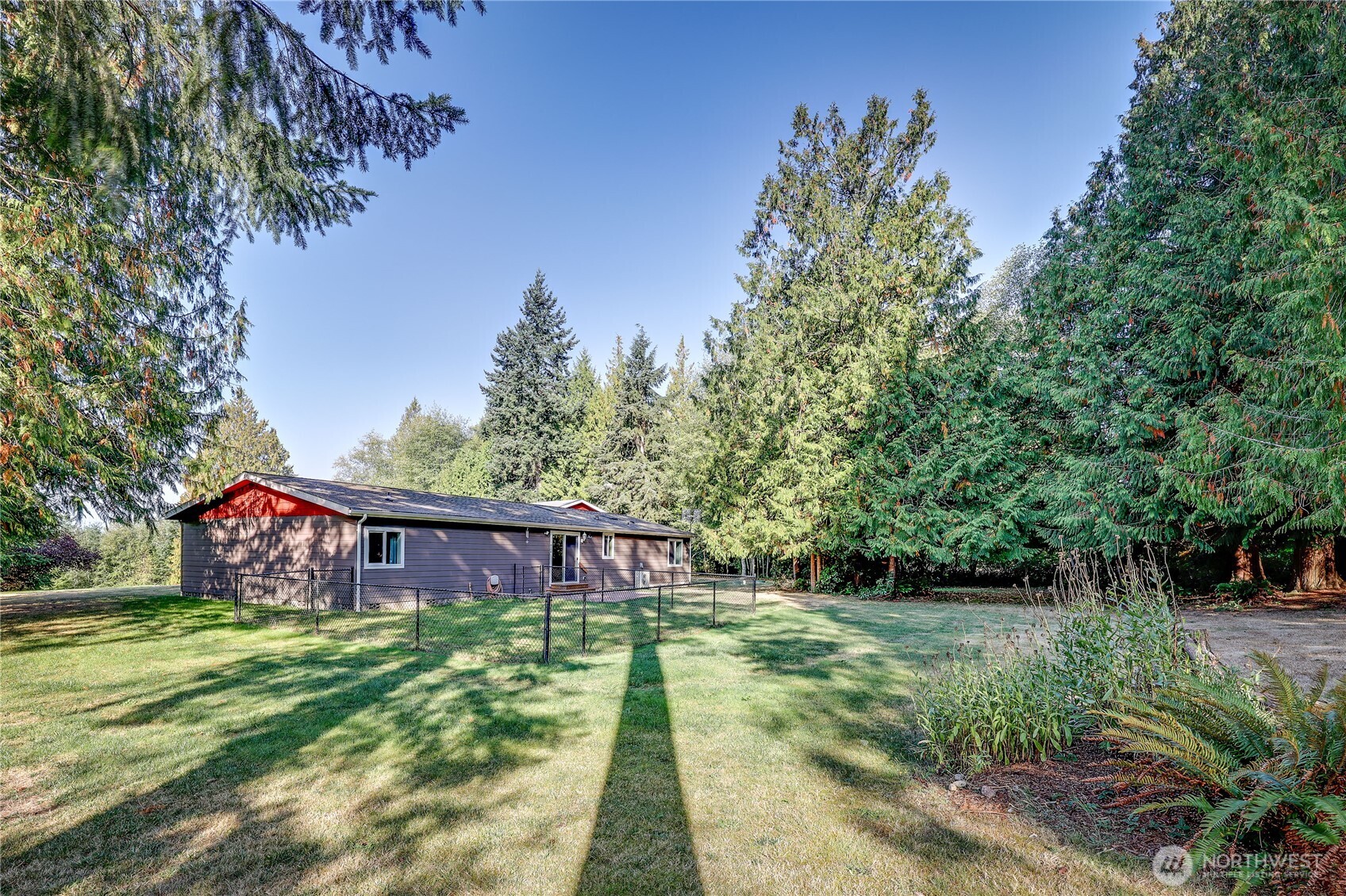 35025 Little Boston Road Northeast Kingston, WA 98346 - Photo 33 of 40 a view of a house with a yard