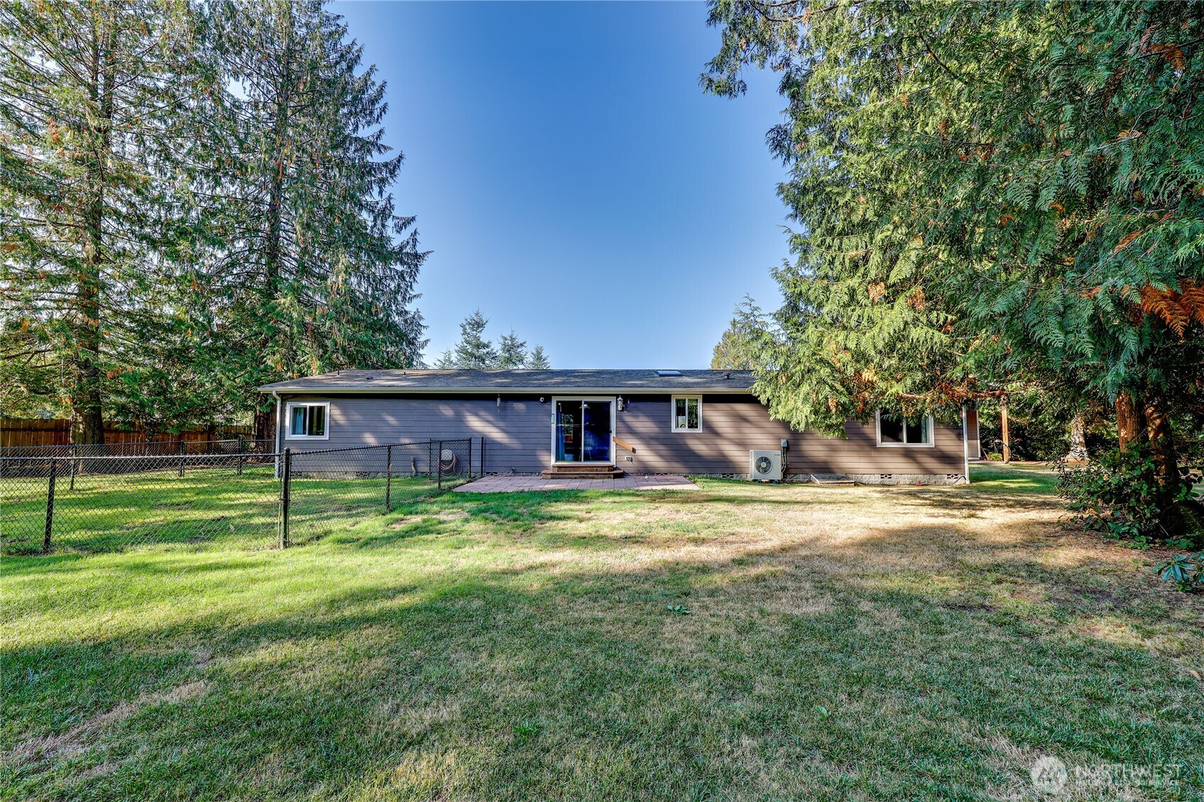 35025 Little Boston Road Northeast Kingston, WA 98346 - Photo 34 of 40 a view of a house with a yard