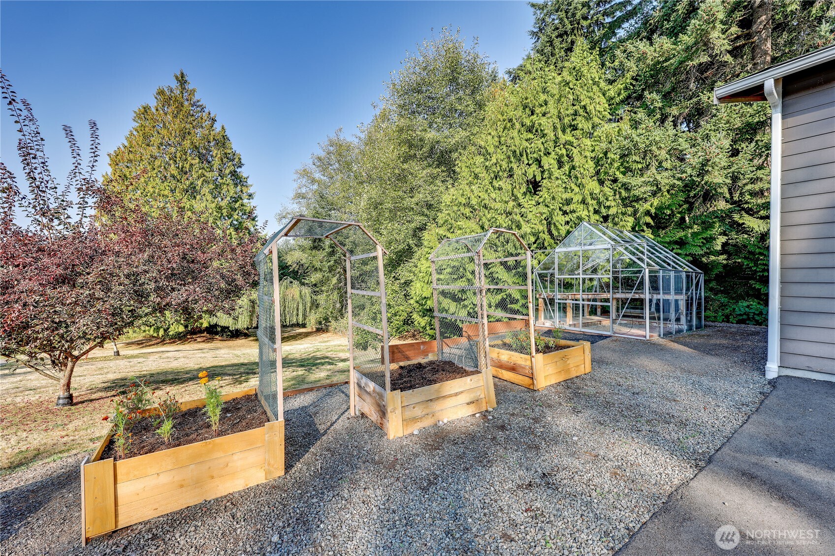 35025 Little Boston Road Northeast Kingston, WA 98346 - Photo 35 of 40 swimming pool view with a garden space