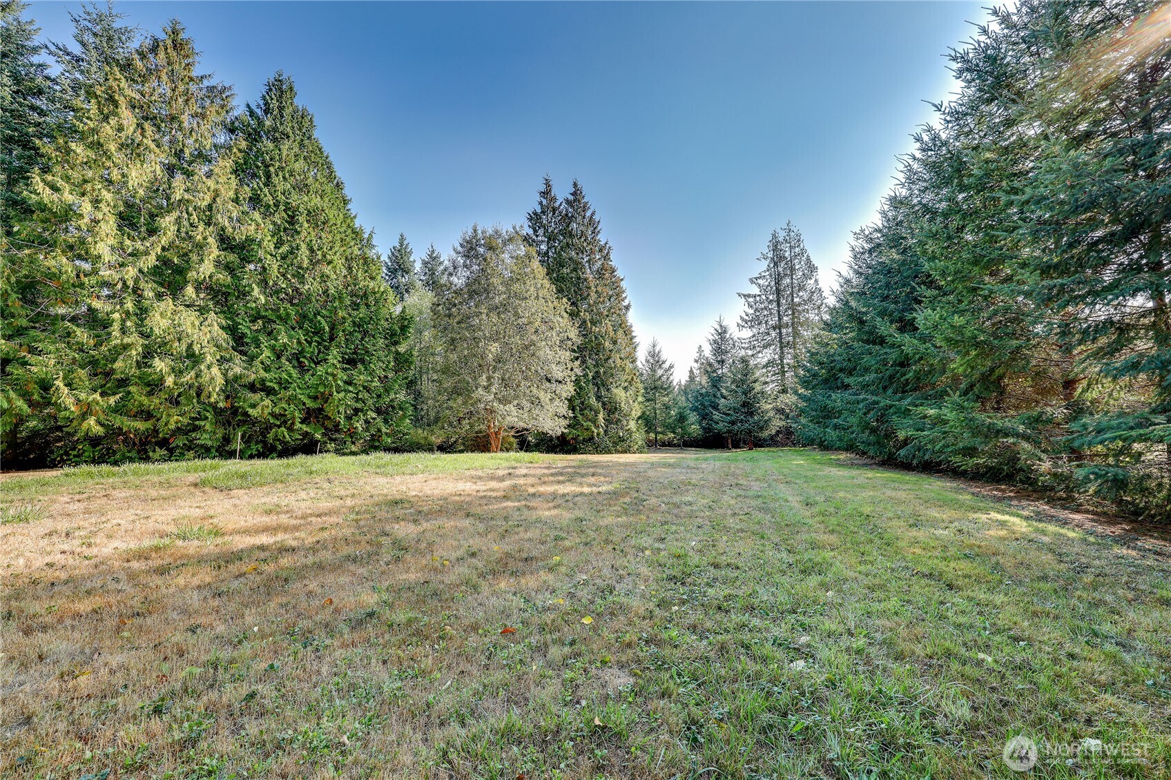 35025 Little Boston Road Northeast Kingston, WA 98346 - Photo 37 of 40 a view of an outdoor space and a yard