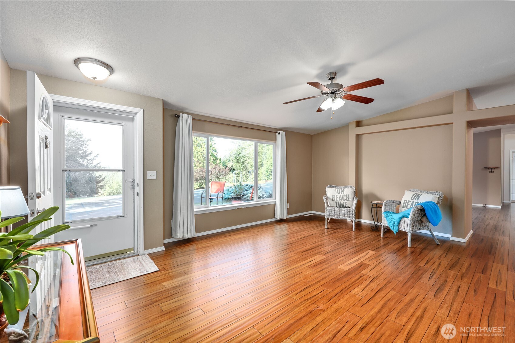 35025 Little Boston Road Northeast Kingston, WA 98346 - Photo 5 of 40 a view of a livingroom with furniture and a flat screen tv