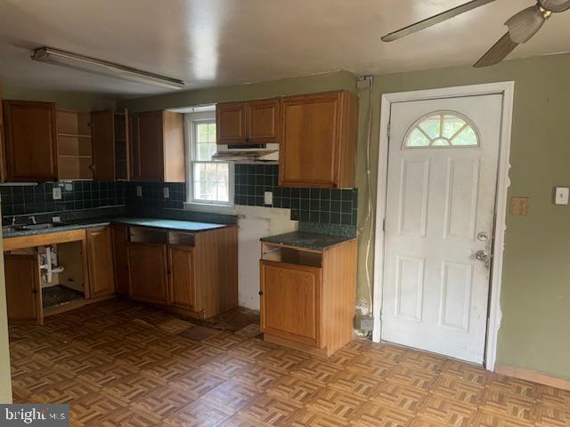4117 Old Muddy Creek Road Edgewater, MD 21037 - Photo 2 of 11 a kitchen with stainless steel appliances granite countertop a stove a sink and a refrigerator