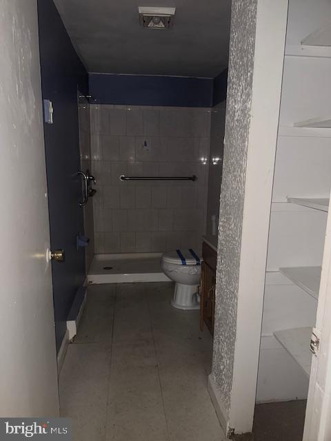 4117 Old Muddy Creek Road Edgewater, MD 21037 - Photo 6 of 11 a bathroom with a toilet and a shower