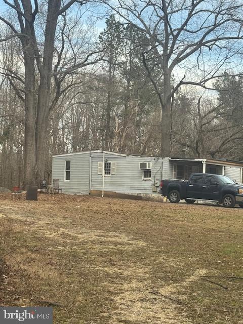 4117 Old Muddy Creek Road Edgewater, MD 21037 - Photo 10 of 11 a backyard of house with large trees