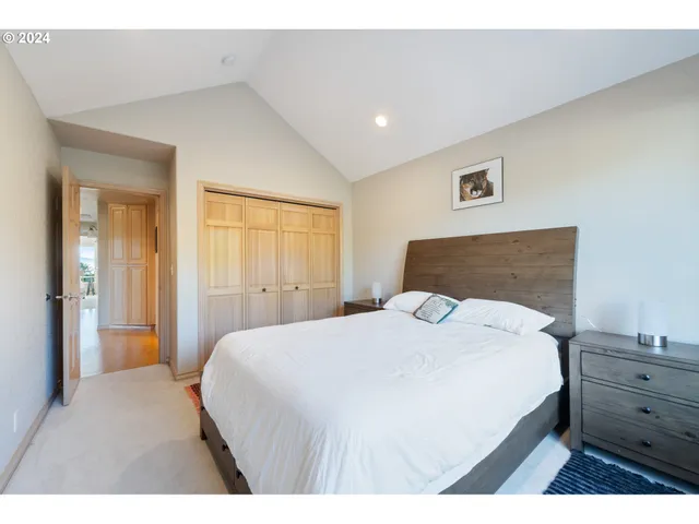 a bathroom with a sink vanity granite shower and a mirror