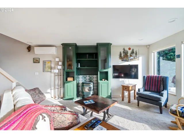 a bedroom with furniture and a fireplace