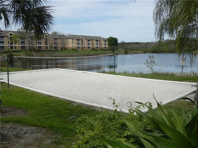 a view of a lake with a big yard