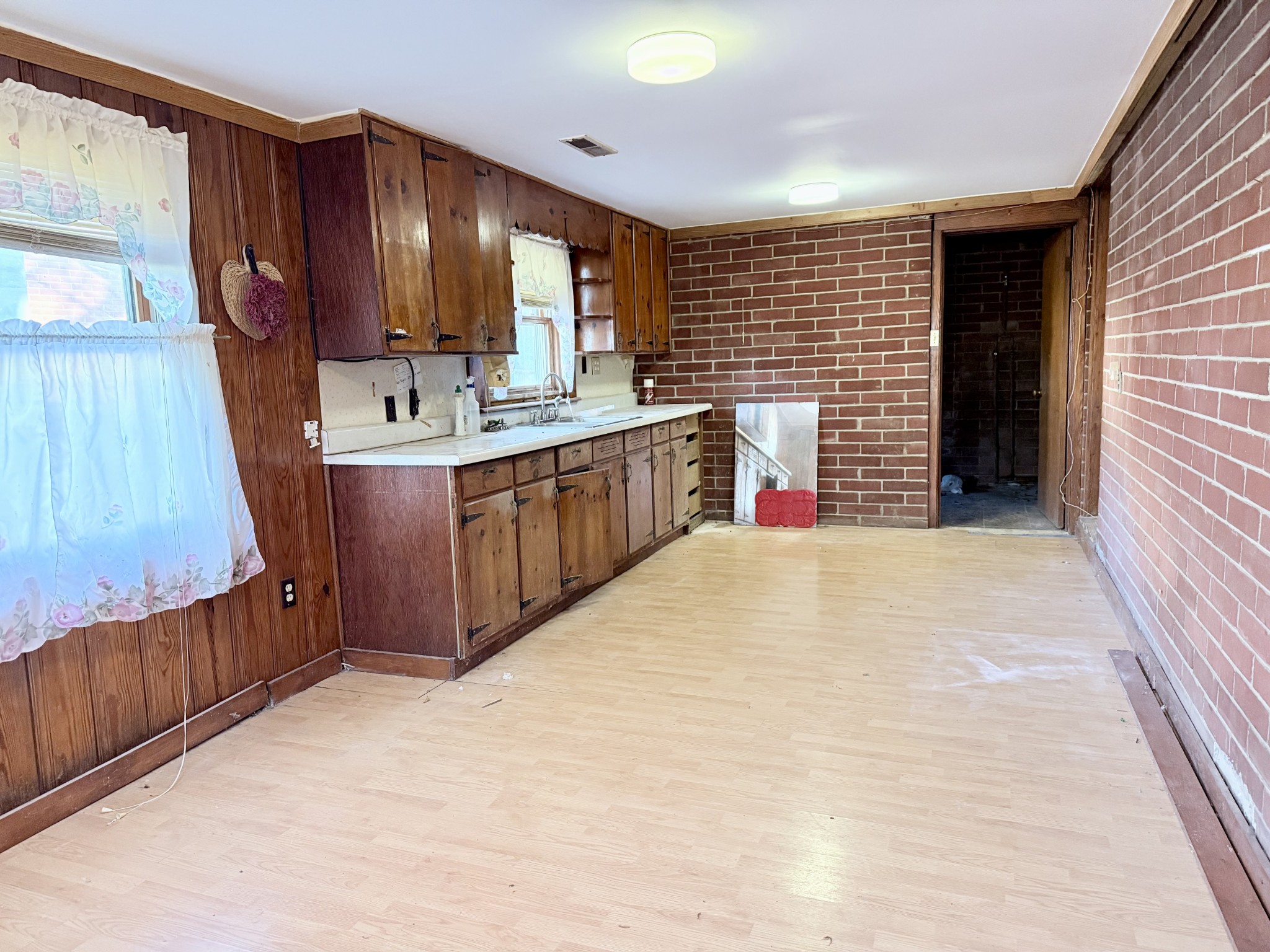2805 Canton Street Hopkinsville, KY 42240 - Photo 2 of 19 a kitchen with stainless steel appliances granite countertop wooden cabinets a sink dishwasher and a stove