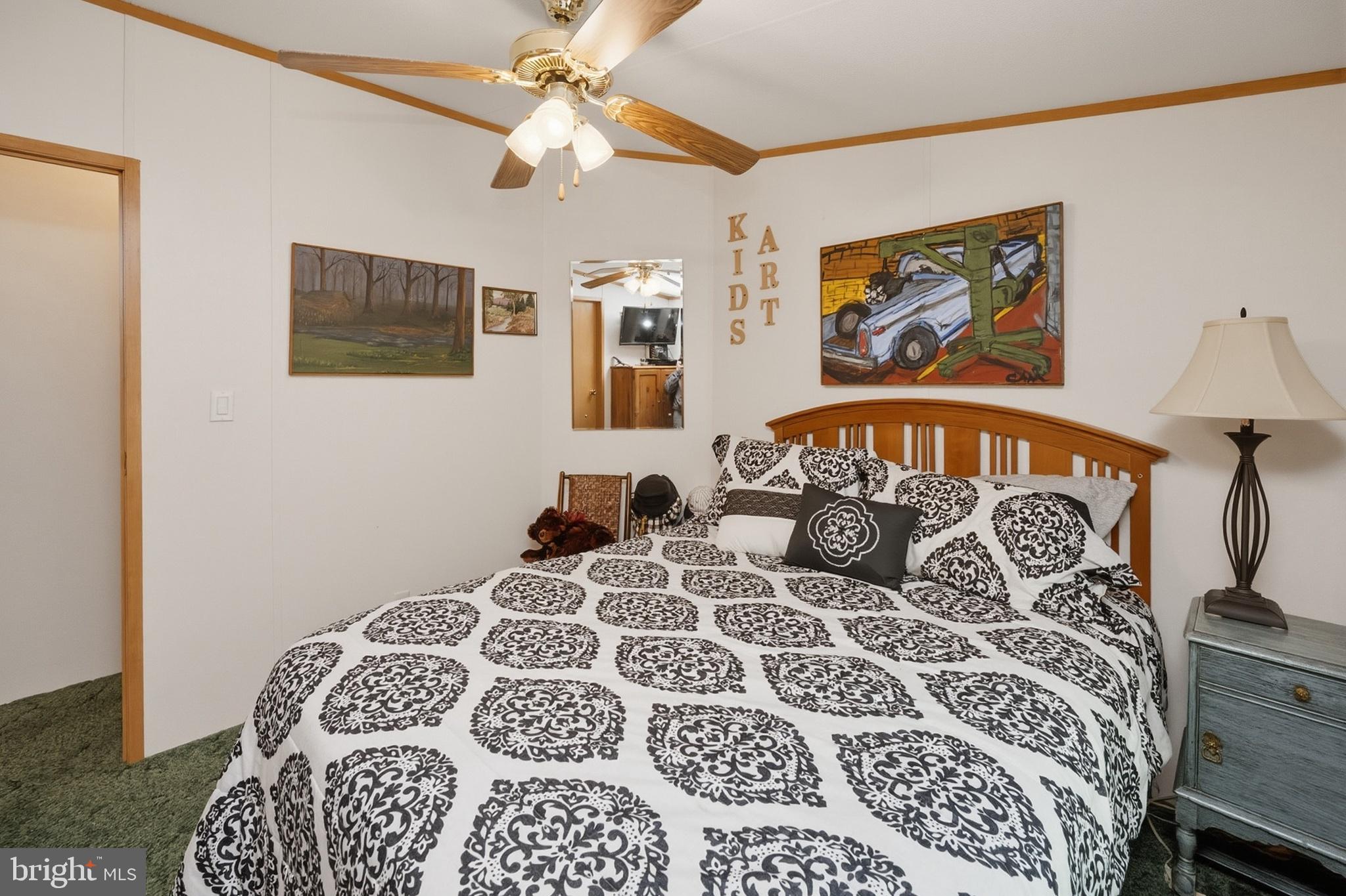 2461 Old Morgantown Road East Accident, MD 21520 - Photo 26 of 50 a bedroom with a large bed and a window