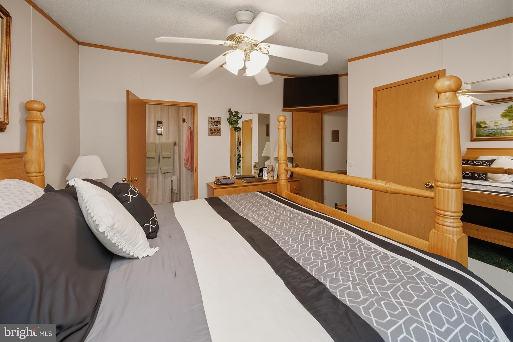 2461 Old Morgantown Road East Accident, MD 21520 - Photo 35 of 50 a view of a bedroom with wooden floor and furniture