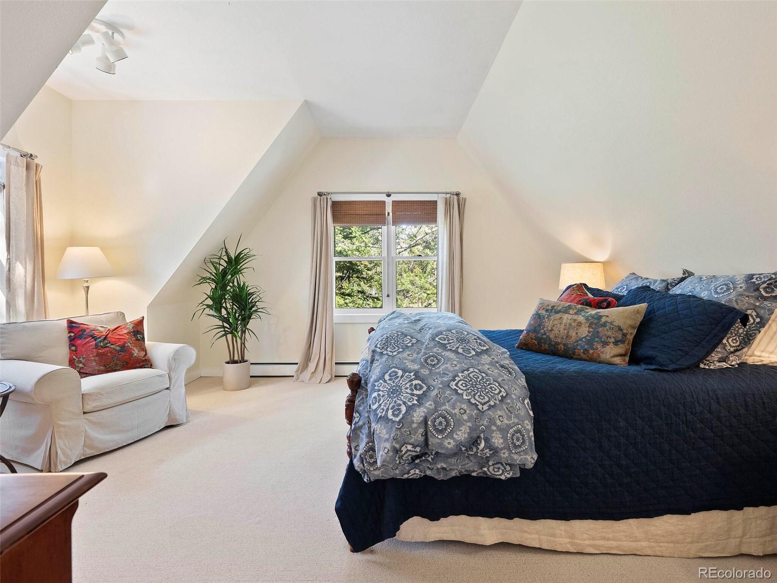 26795 Light Lane Conifer, CO 80433 - Photo 33 of 40 a living room with furniture and a large window