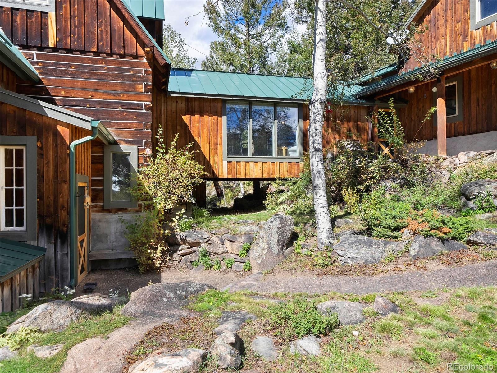 26795 Light Lane Conifer, CO 80433 - Photo 5 of 40 a view of entrance gate of house