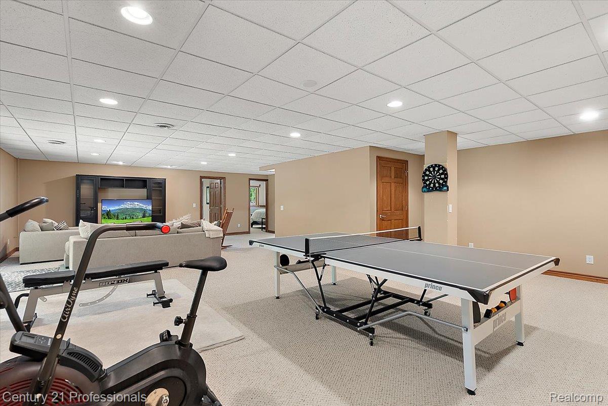 9867 Rainbow Ridge Drive Schoolcraft, MI 49087 - Photo 50 of 82 Spacious recreation area featuring recessed lighting, a drop ceiling, and neutral-toned carpeting