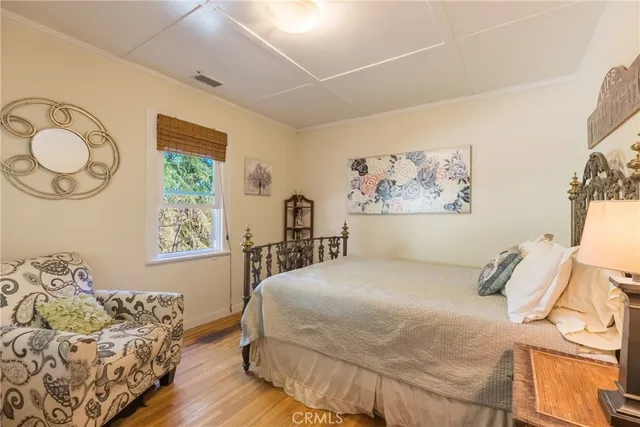 a living room with a couch and a window